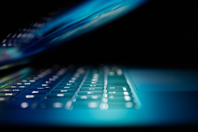 laptop screen and lit keys